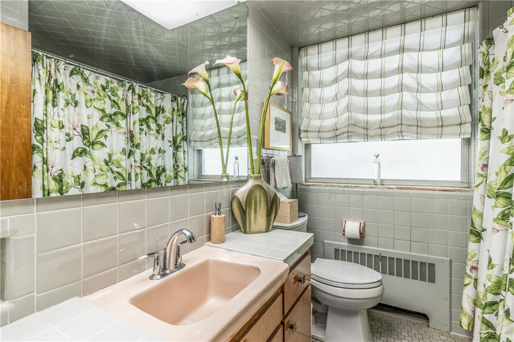 385 Richard Road Wexford, PA 15090 - Photo 20 of 25 The Full Bathroom with Linen Closet is Located Across From the Two Bedrooms.