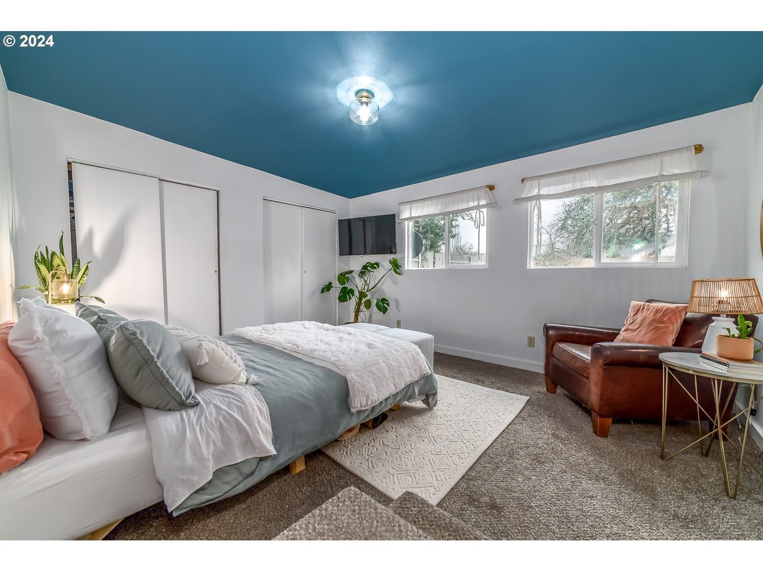 1437 E Street Springfield, OR 97477 - Photo 16 of 32 a bedroom with furniture and a window