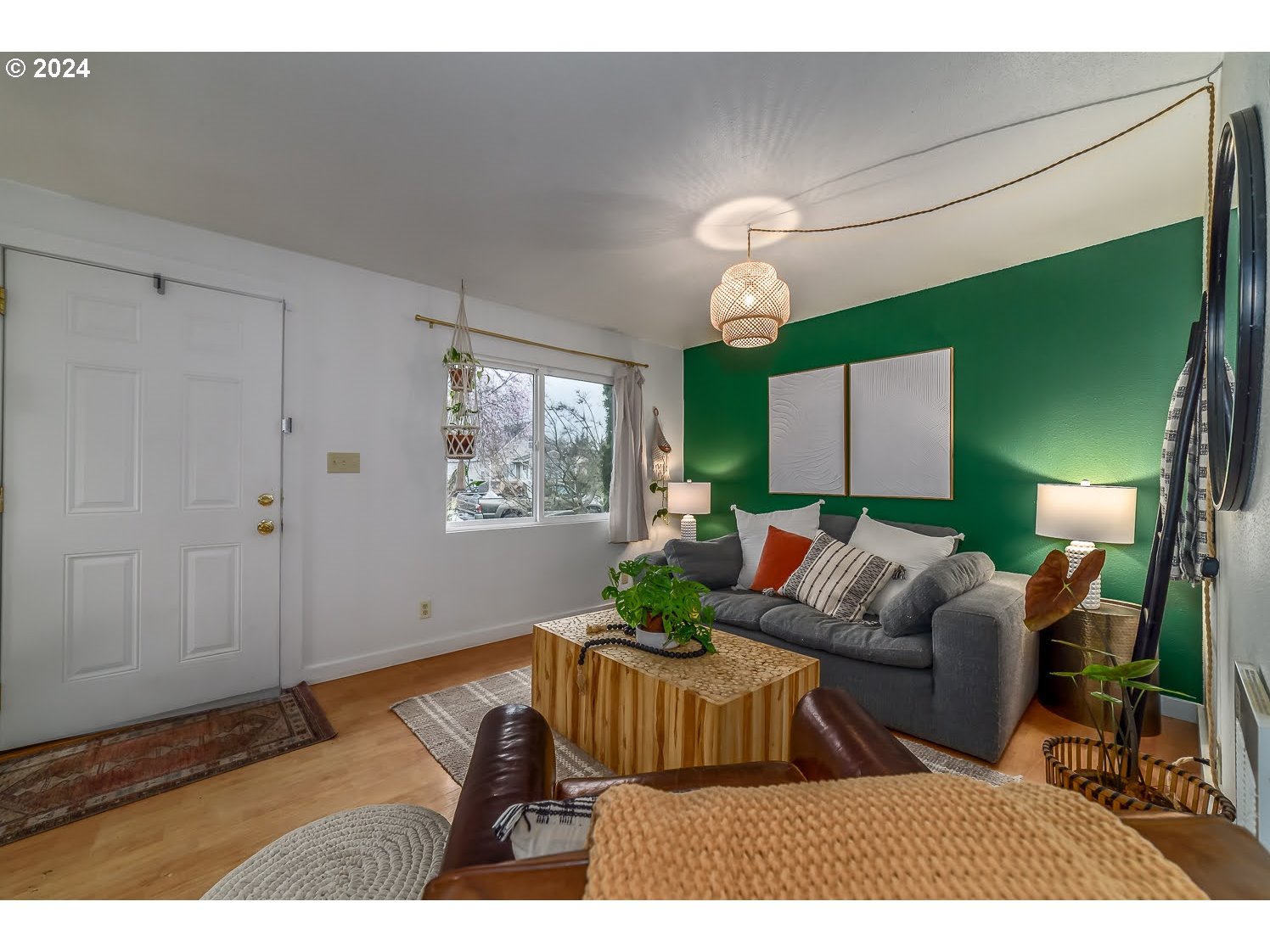 1437 E Street Springfield, OR 97477 - Photo 6 of 32 a living room with furniture a dining table and a window