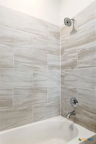 a bathroom with a bathtub