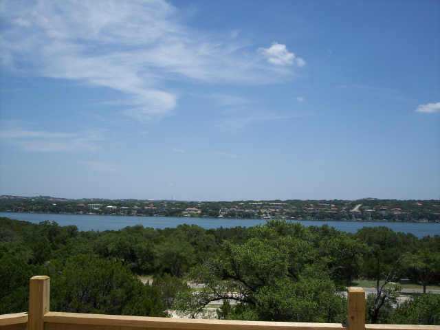 219 Southwind Road Point Venture, TX 78645 - Photo 1 of 1 a view of a city and mountain