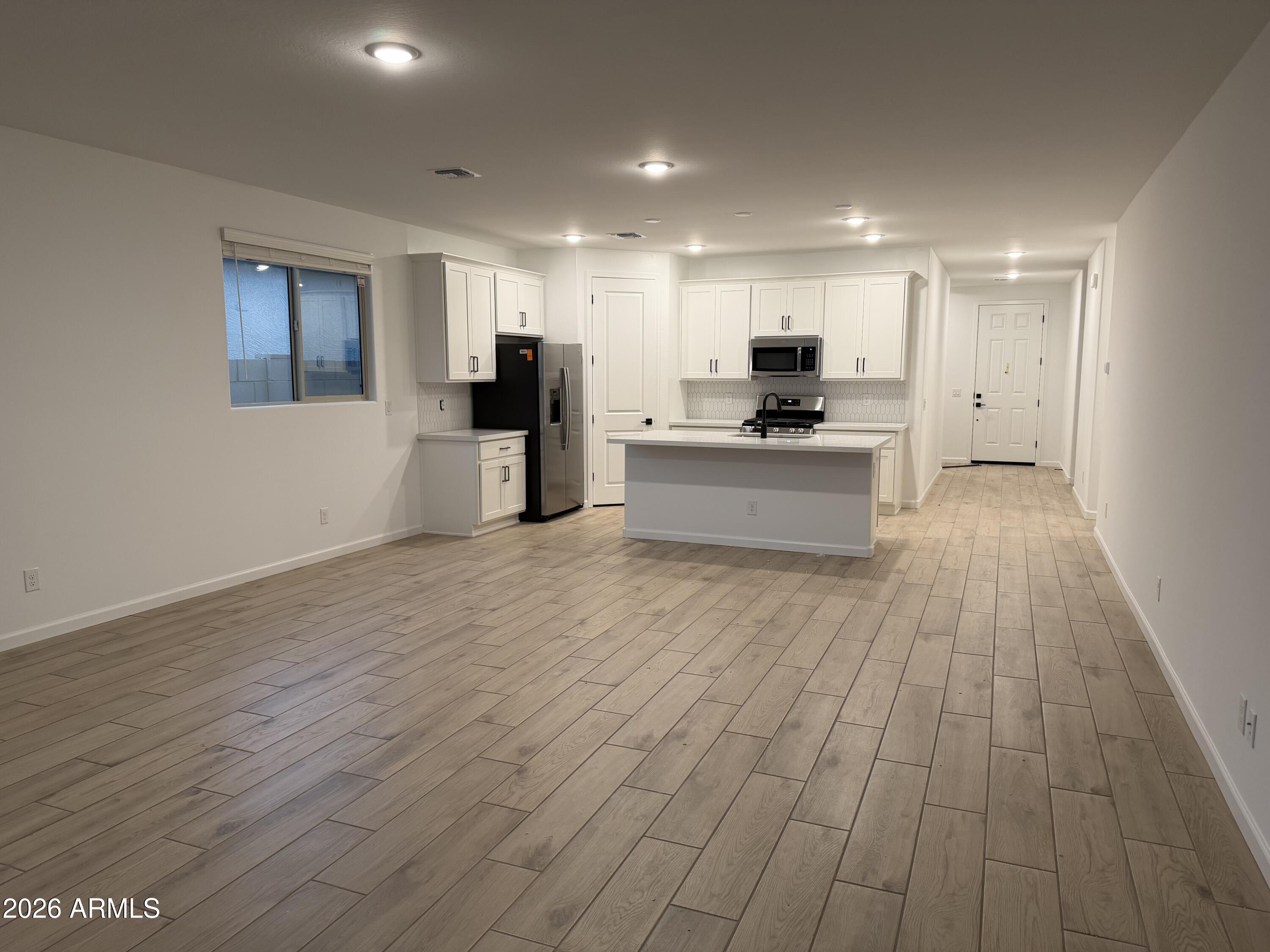 5540 West Piedmont Road Laveen, AZ 85339 - Photo 11 of 31 0010_ Great Room & Kitchen