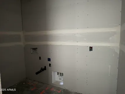 a view of small space with racks on the wall