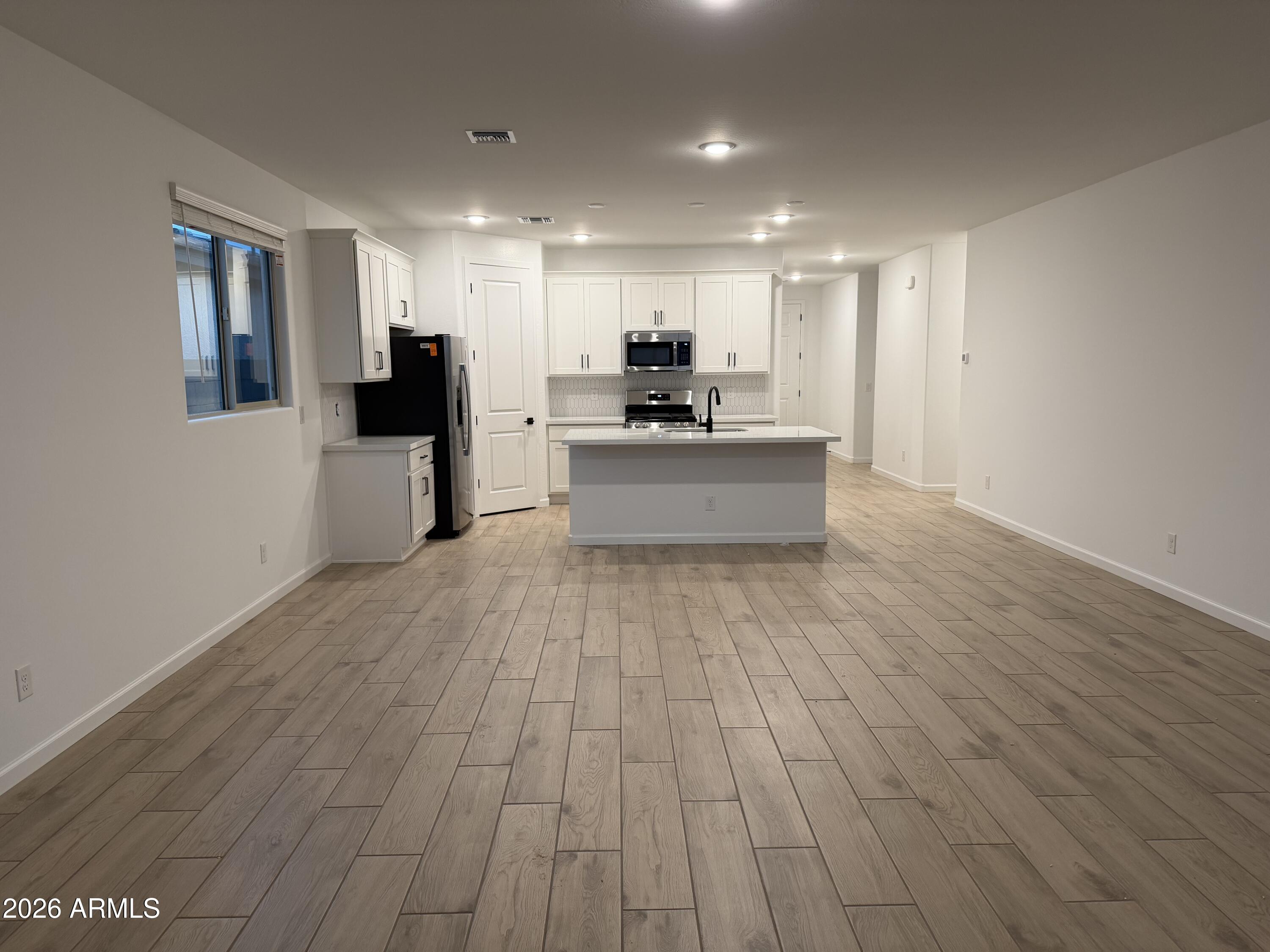 5540 West Piedmont Road Laveen, AZ 85339 - Photo 12 of 31 0011_ Great Room & Kitchen