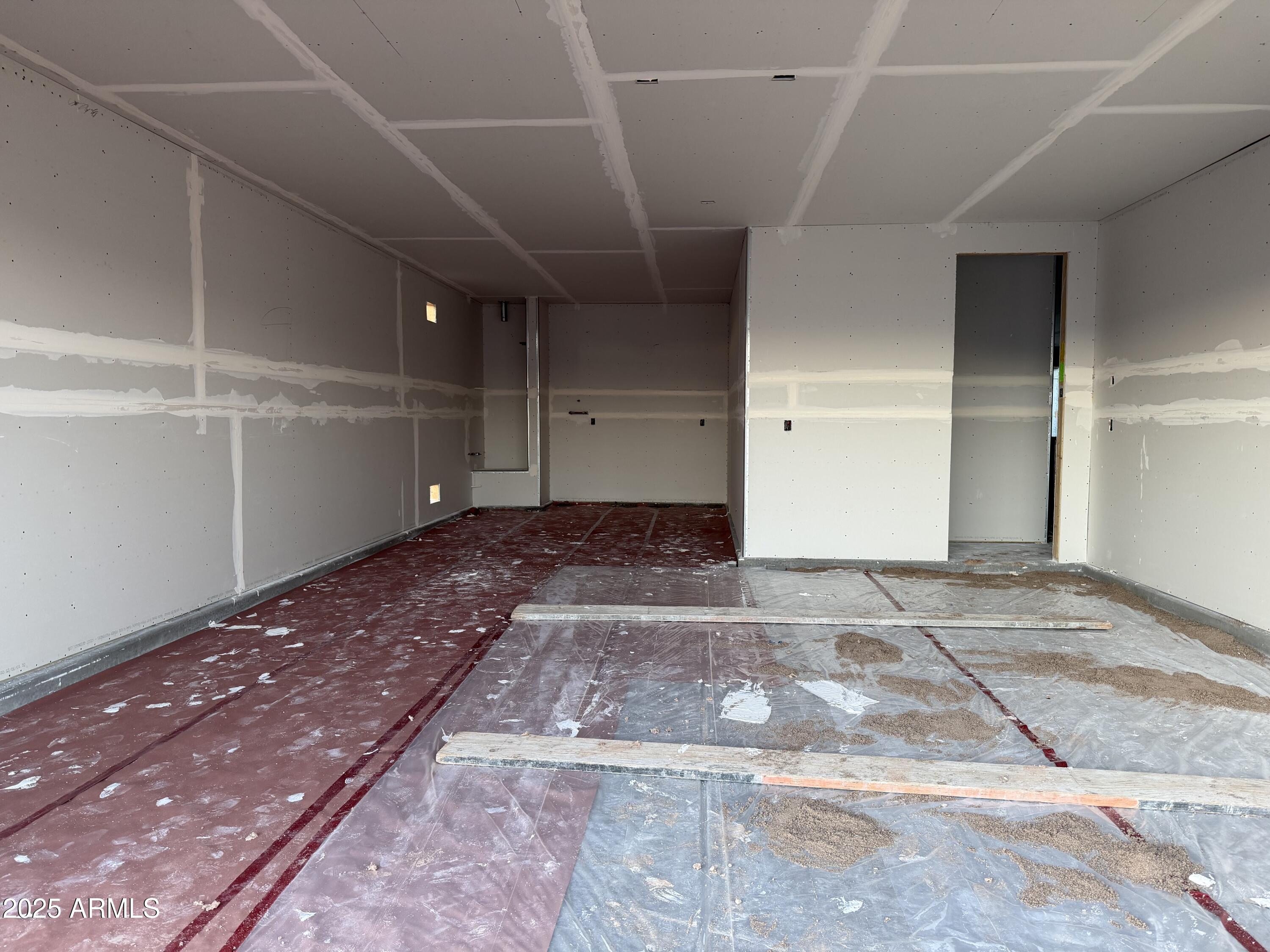 5540 West Piedmont Road Laveen, AZ 85339 - Photo 14 of 26 a view of a hallway with wooden floor