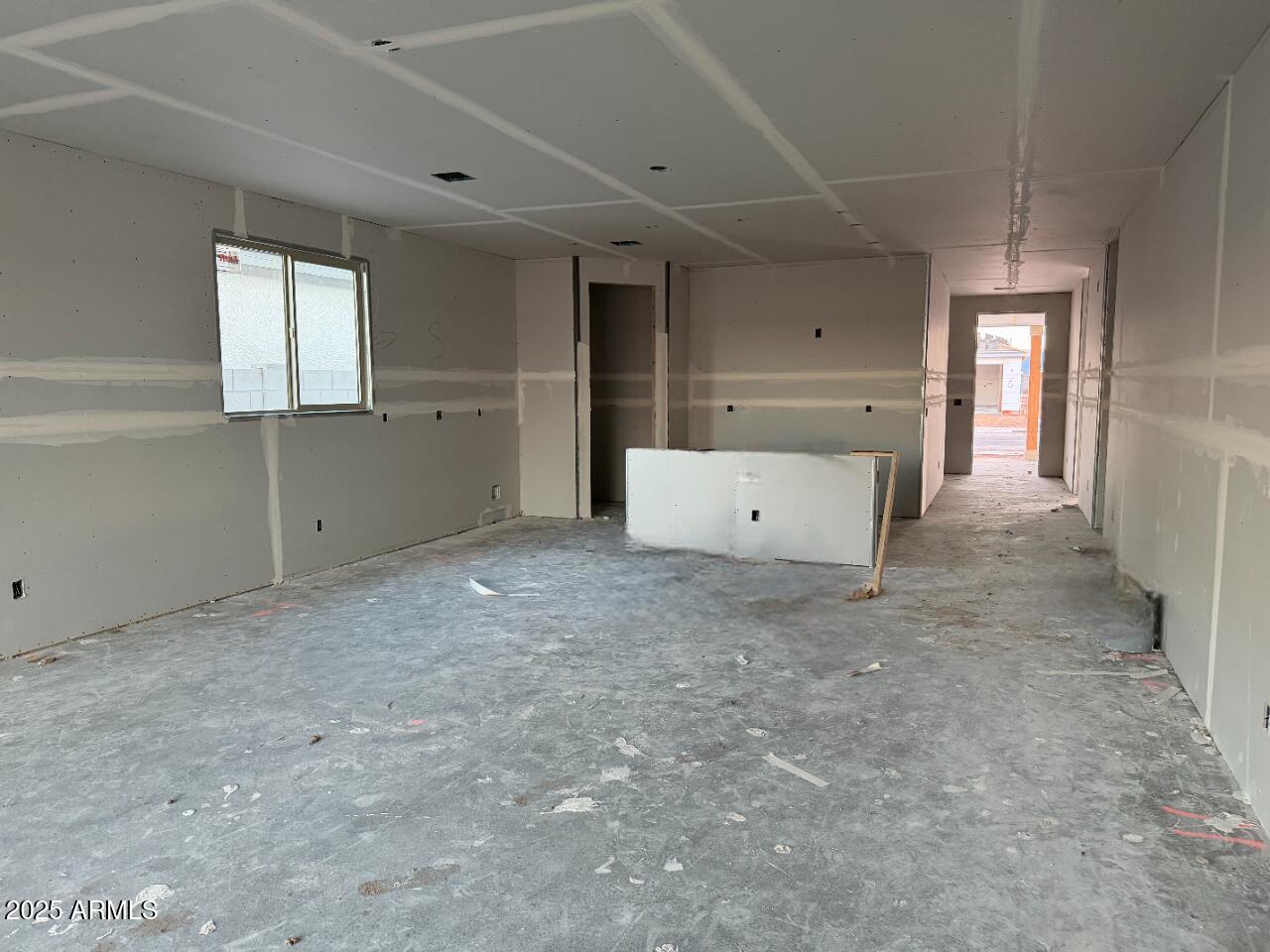 5540 West Piedmont Road Laveen, AZ 85339 - Photo 8 of 26 an empty room with windows and closet