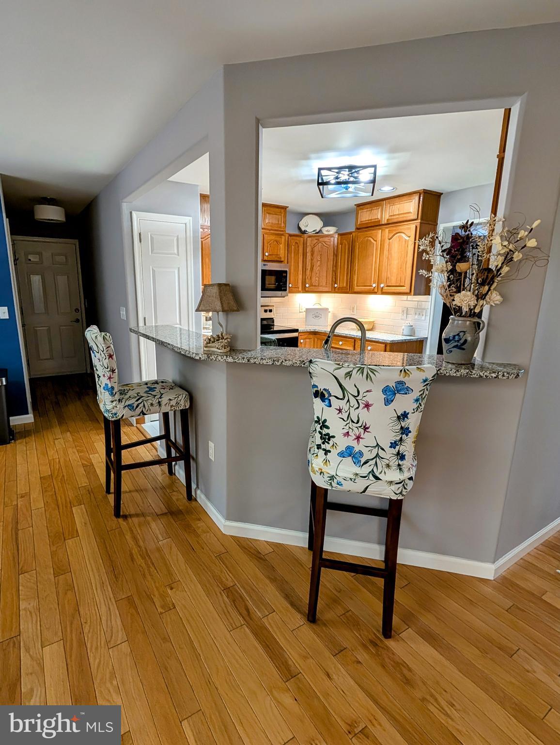 5495 Deer Path Lane Gap, PA 17527 - Photo 18 of 38 a living room with furniture and a wooden floor
