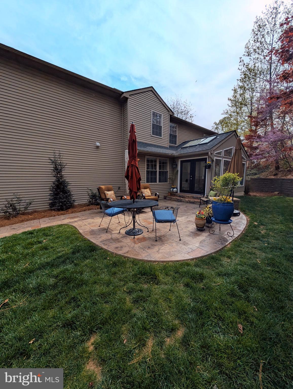 5495 Deer Path Lane Gap, PA 17527 - Photo 4 of 38 a view of a house with a backyard porch and sitting area