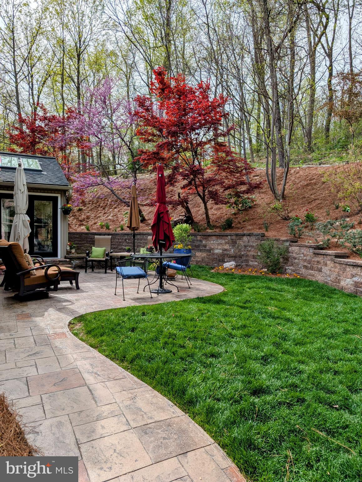 5495 Deer Path Lane Gap, PA 17527 - Photo 7 of 38 a view of a backyard with a bench