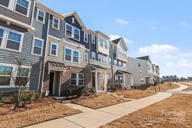 a front view of a building with street view