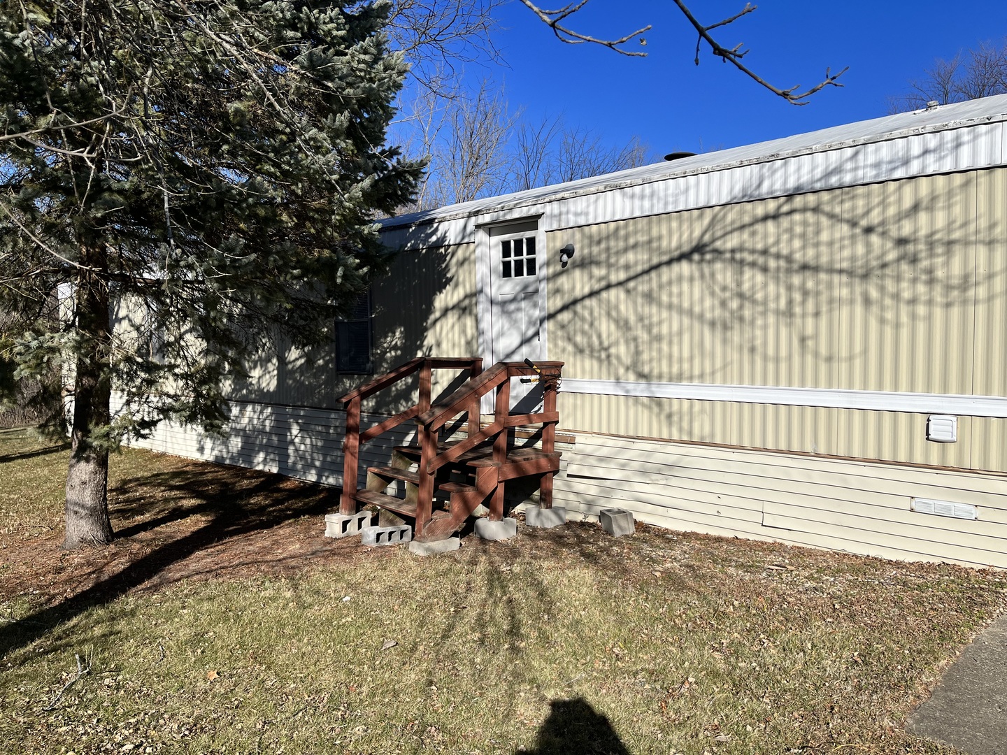 a view of a backyard with a bench