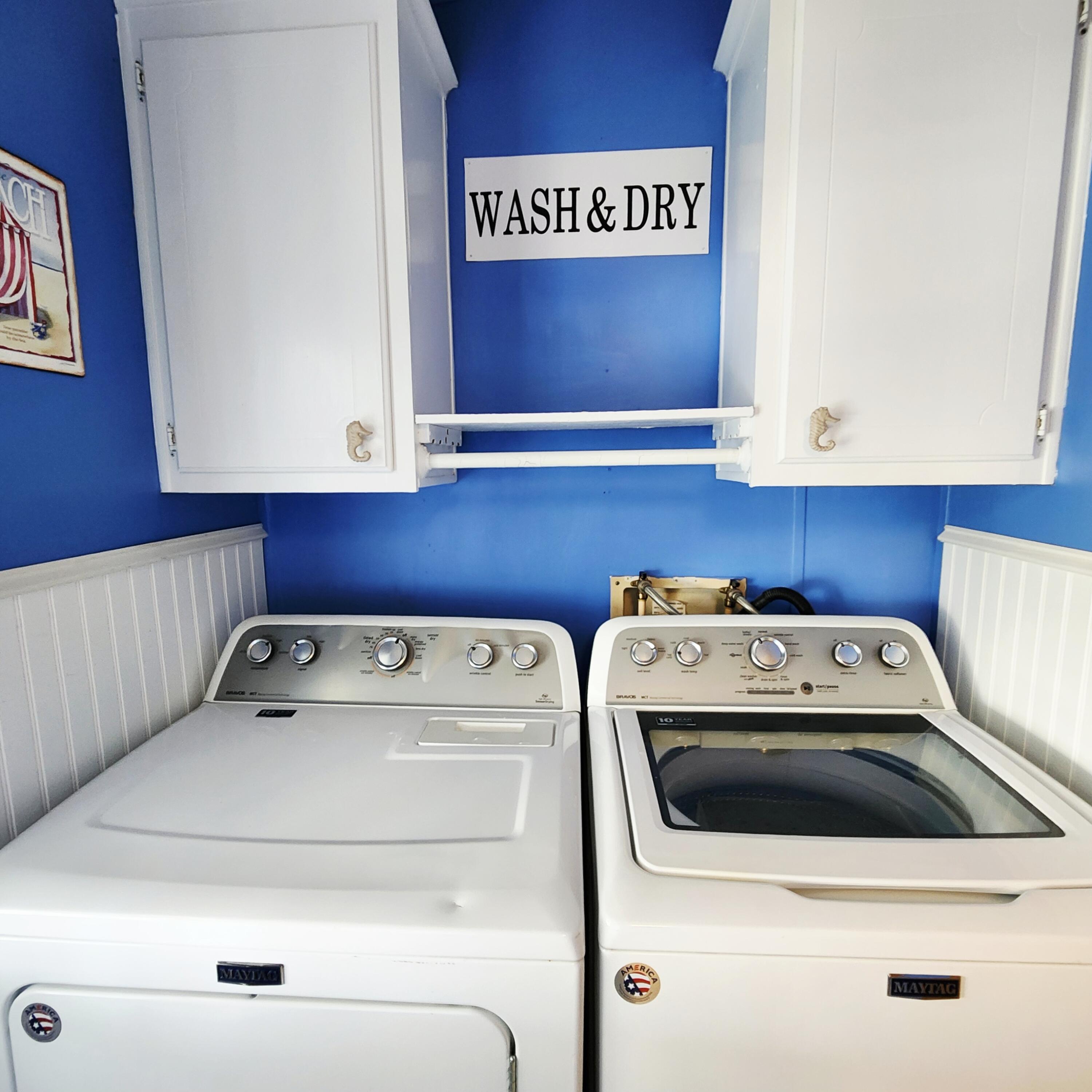 526 Hemingway Terrace, Unit F02 Fort Pierce, FL 34982 - Photo 15 of 55 a utility room with dryer and washer