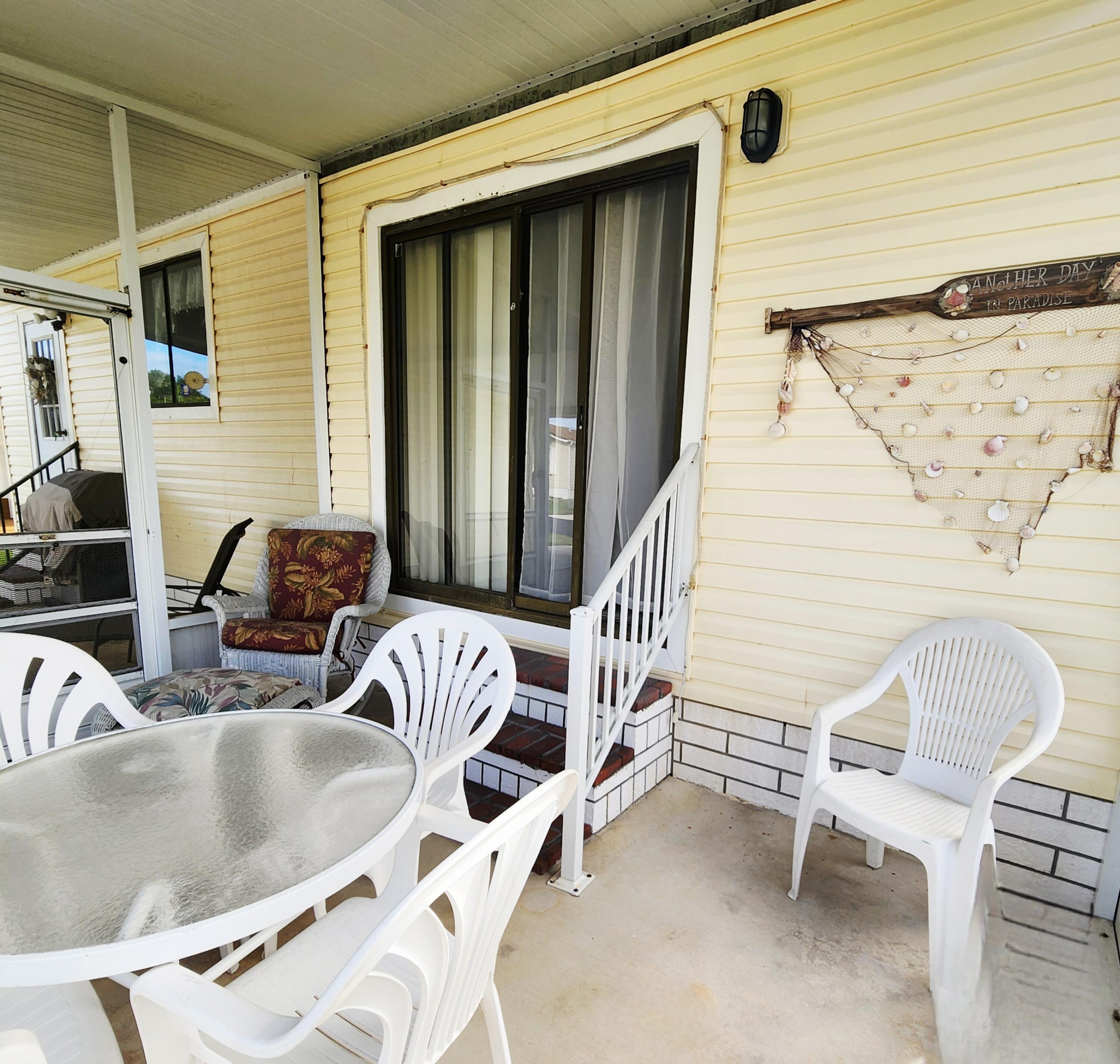 526 Hemingway Terrace, Unit F02 Fort Pierce, FL 34982 - Photo 38 of 55 a view of balcony with furniture