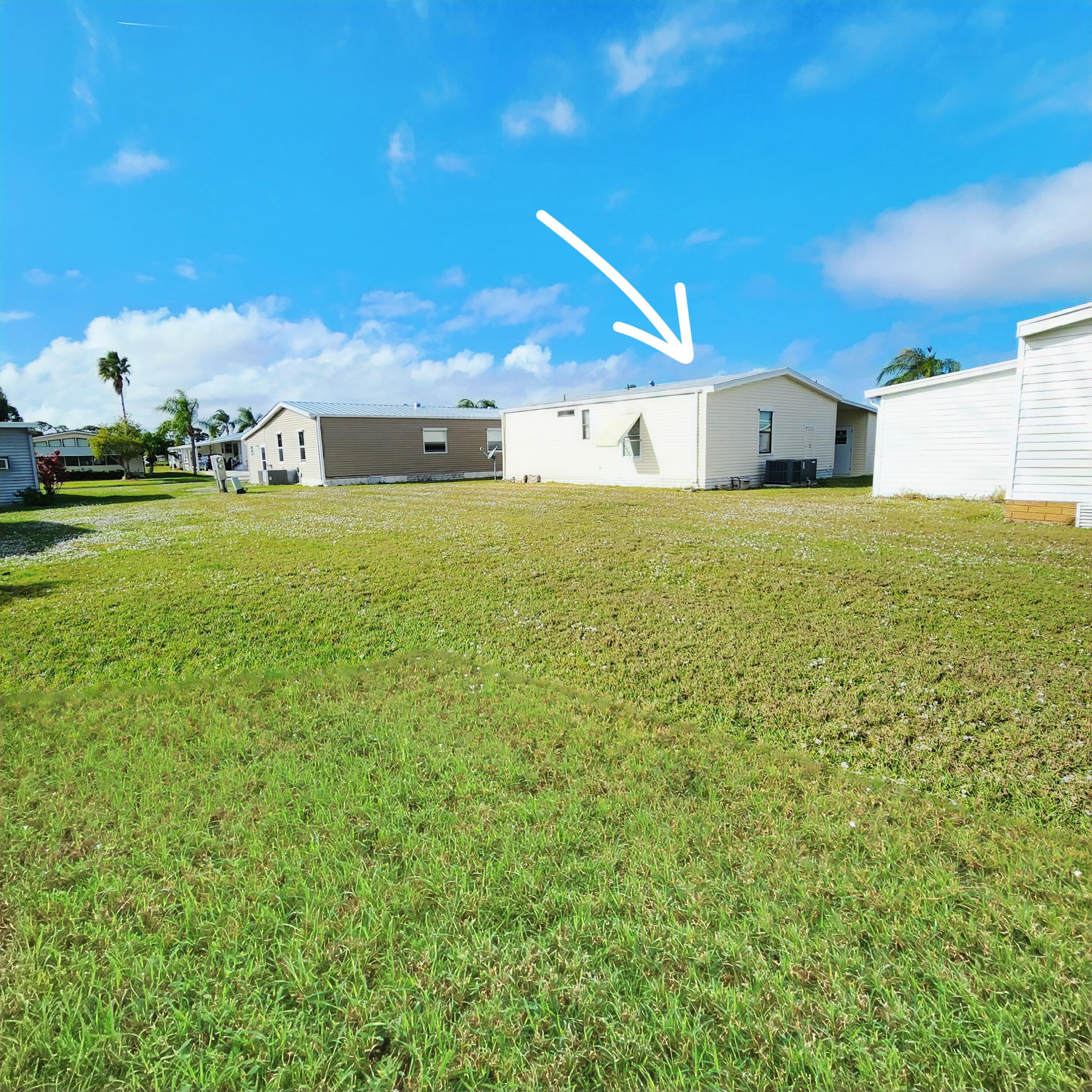 526 Hemingway Terrace, Unit F02 Fort Pierce, FL 34982 - Photo 54 of 55 a view of a big room with table and chairs