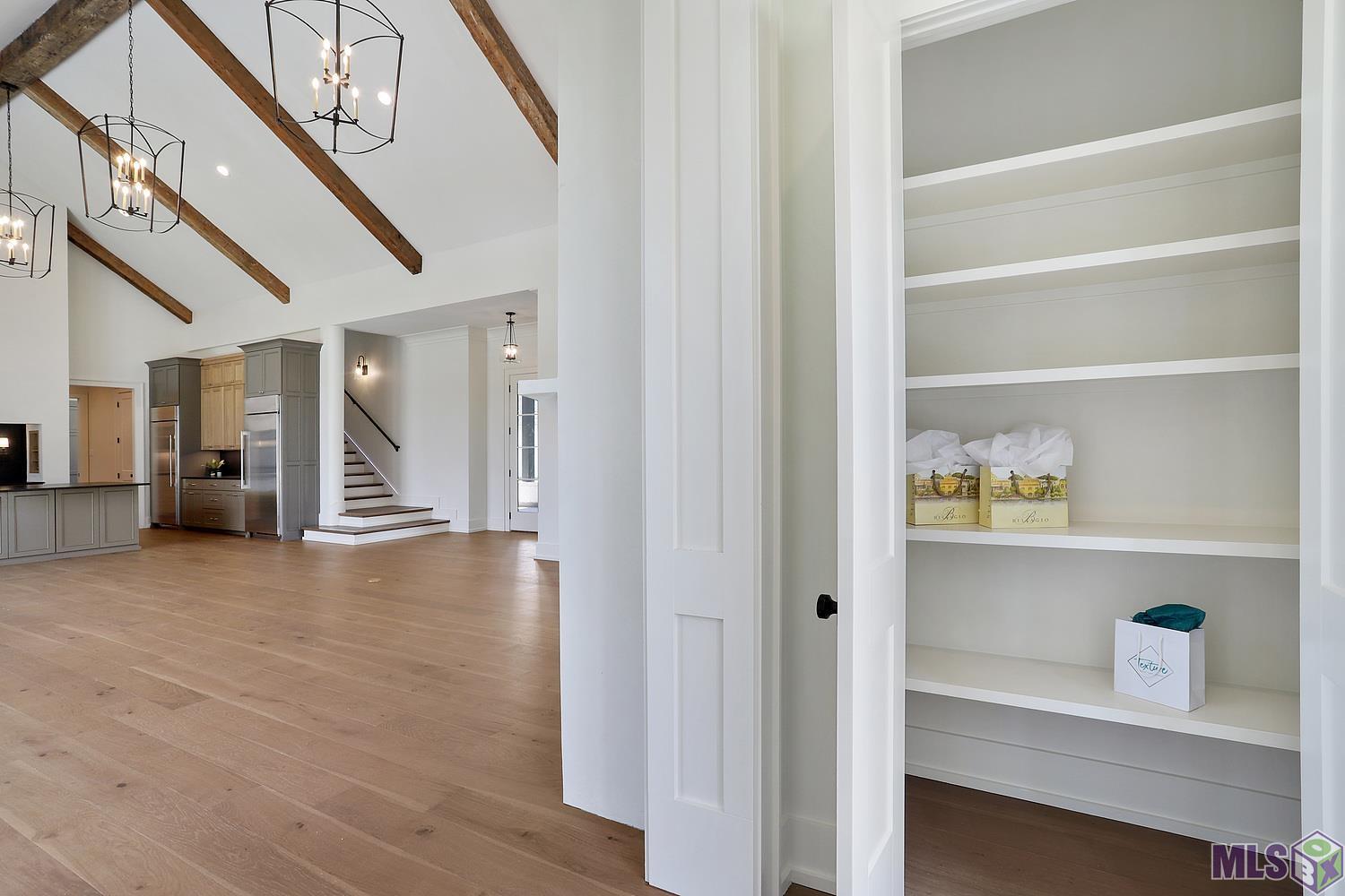 6529 Feather Rdg Drive Baton Rouge, LA 70817 - Photo 23 of 50 Additional linen closet off hall to main bedroom