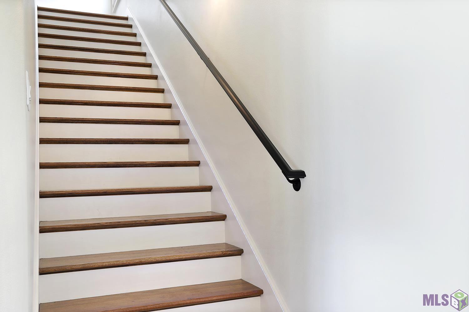 6529 Feather Rdg Drive Baton Rouge, LA 70817 - Photo 32 of 50 Wide staircase w/ accent lighting