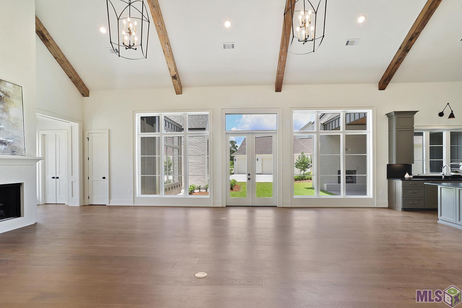 6529 Feather Rdg Drive Baton Rouge, LA 70817 - Photo 33 of 50 Family room toward yard; gorgeous lighting