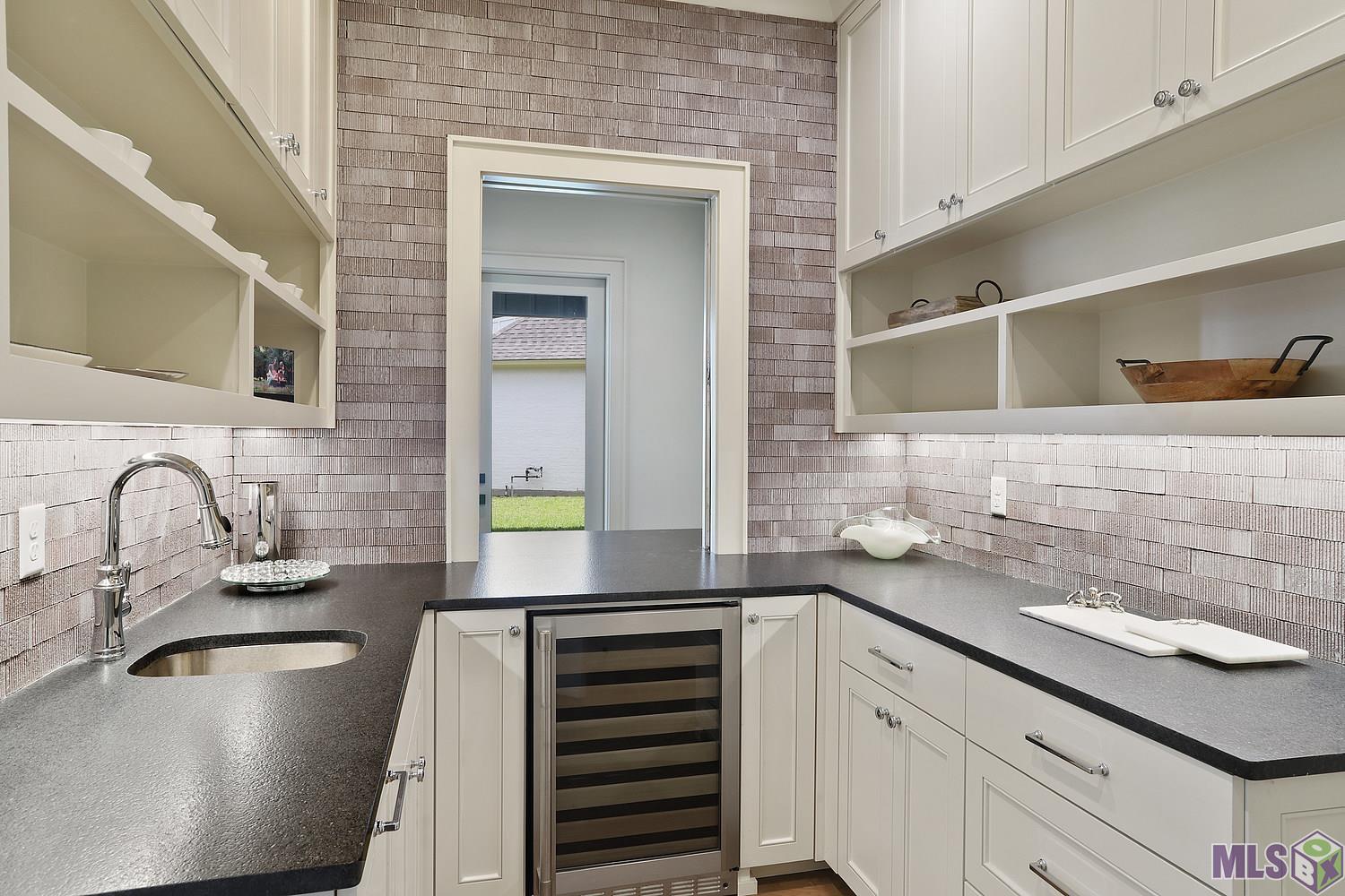 6529 Feather Rdg Drive Baton Rouge, LA 70817 - Photo 44 of 50 Butler's pantry w/ lots of Cabinets & shelving