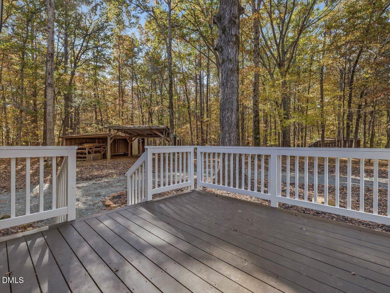 1838 Alex Cockman Road Pittsboro, NC 27312 - Photo 32 of 53 a view of deck with wooden floor and fence