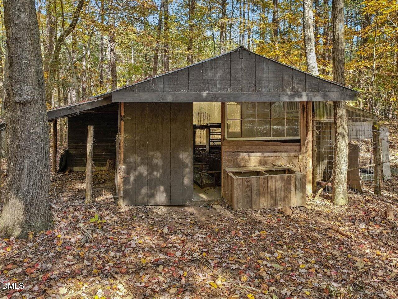 1838 Alex Cockman Road Pittsboro, NC 27312 - Photo 43 of 53 a house view with a outdoor space
