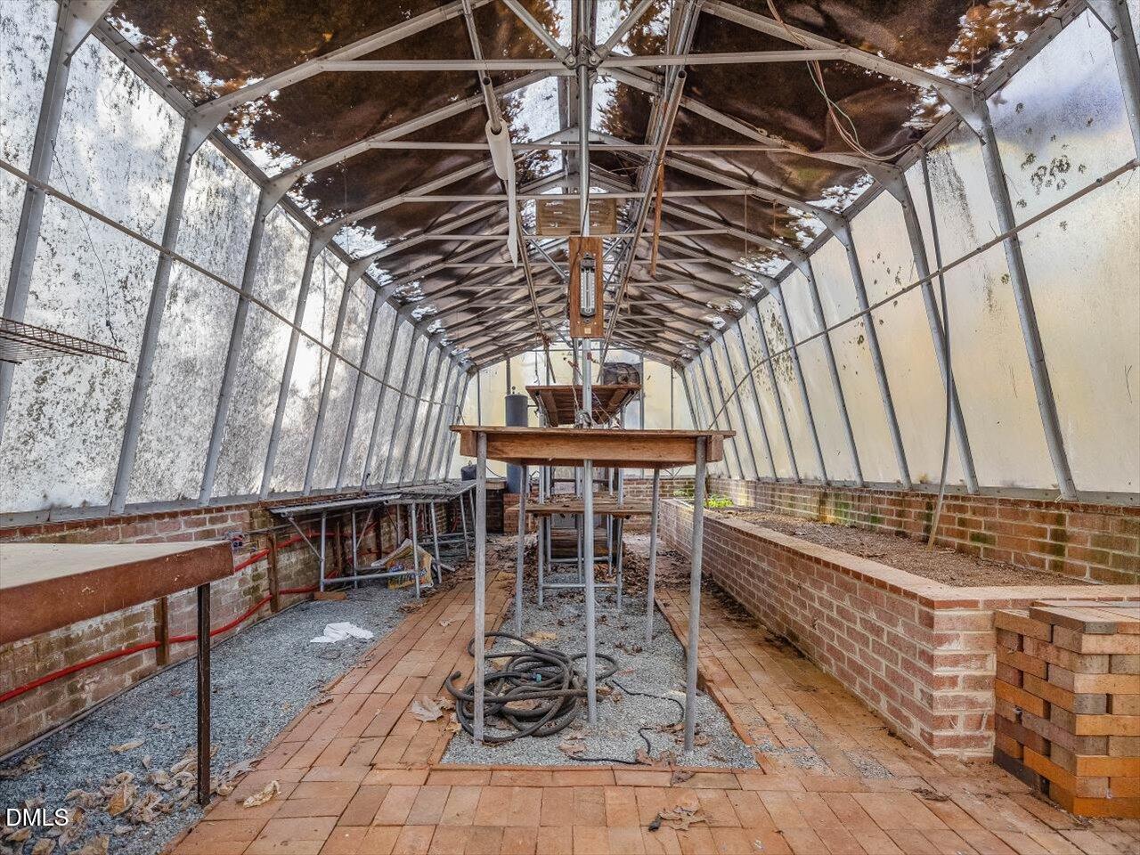 1838 Alex Cockman Road Pittsboro, NC 27312 - Photo 47 of 53 a dining room with furniture and a table