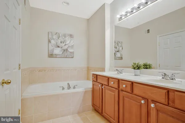 a view of storage and utility room with washer and dryer