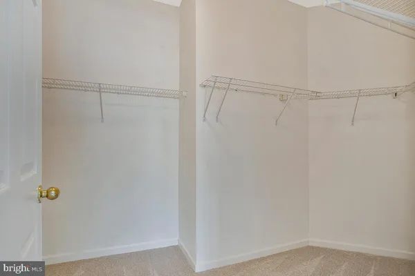 a view of a workspace with furniture