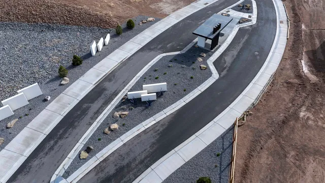 a view of a house with a road