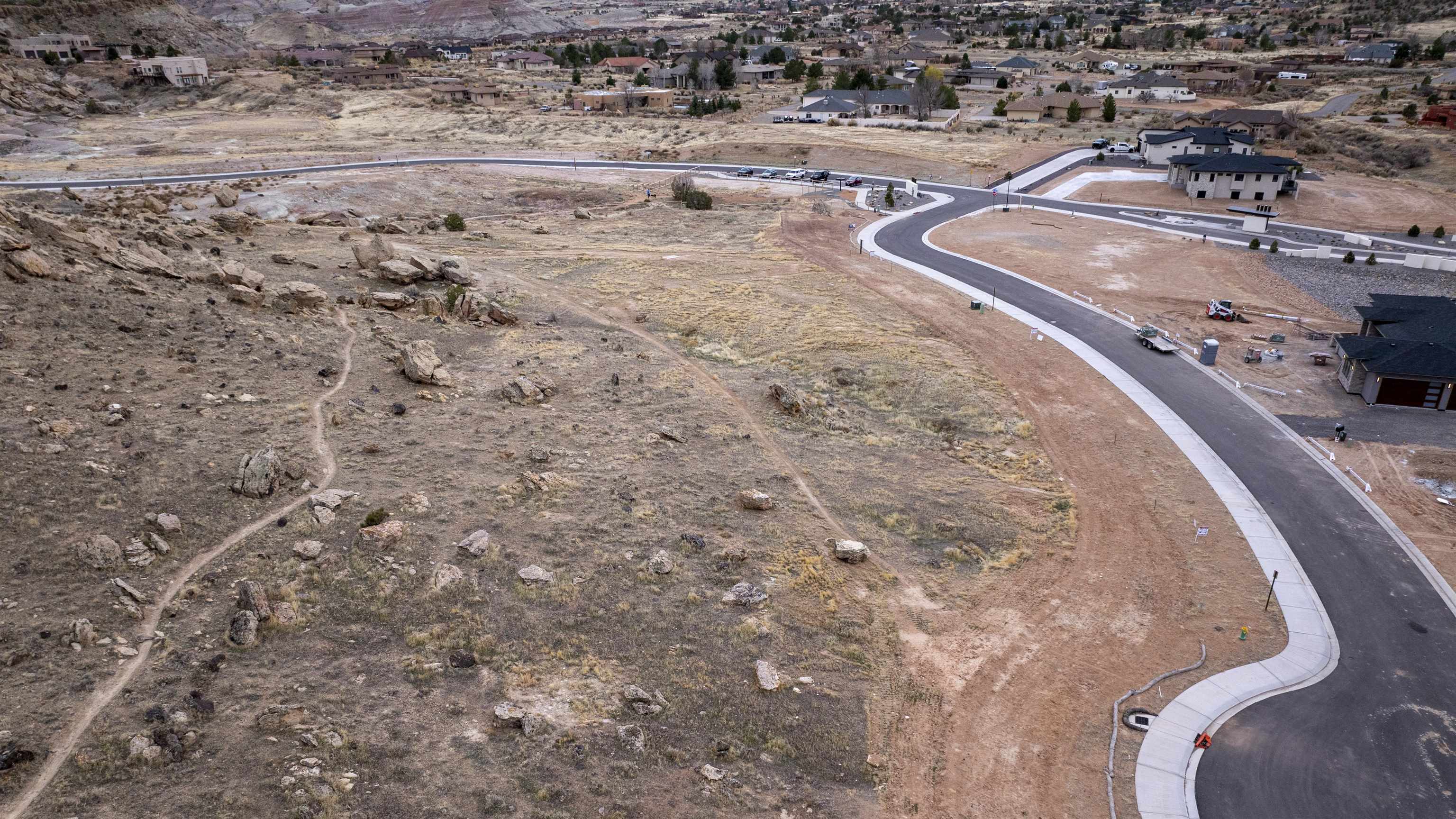 356 Canyon Rim Court Grand Junction, CO 81507 - Photo 7 of 22 a view of a backyard of a house