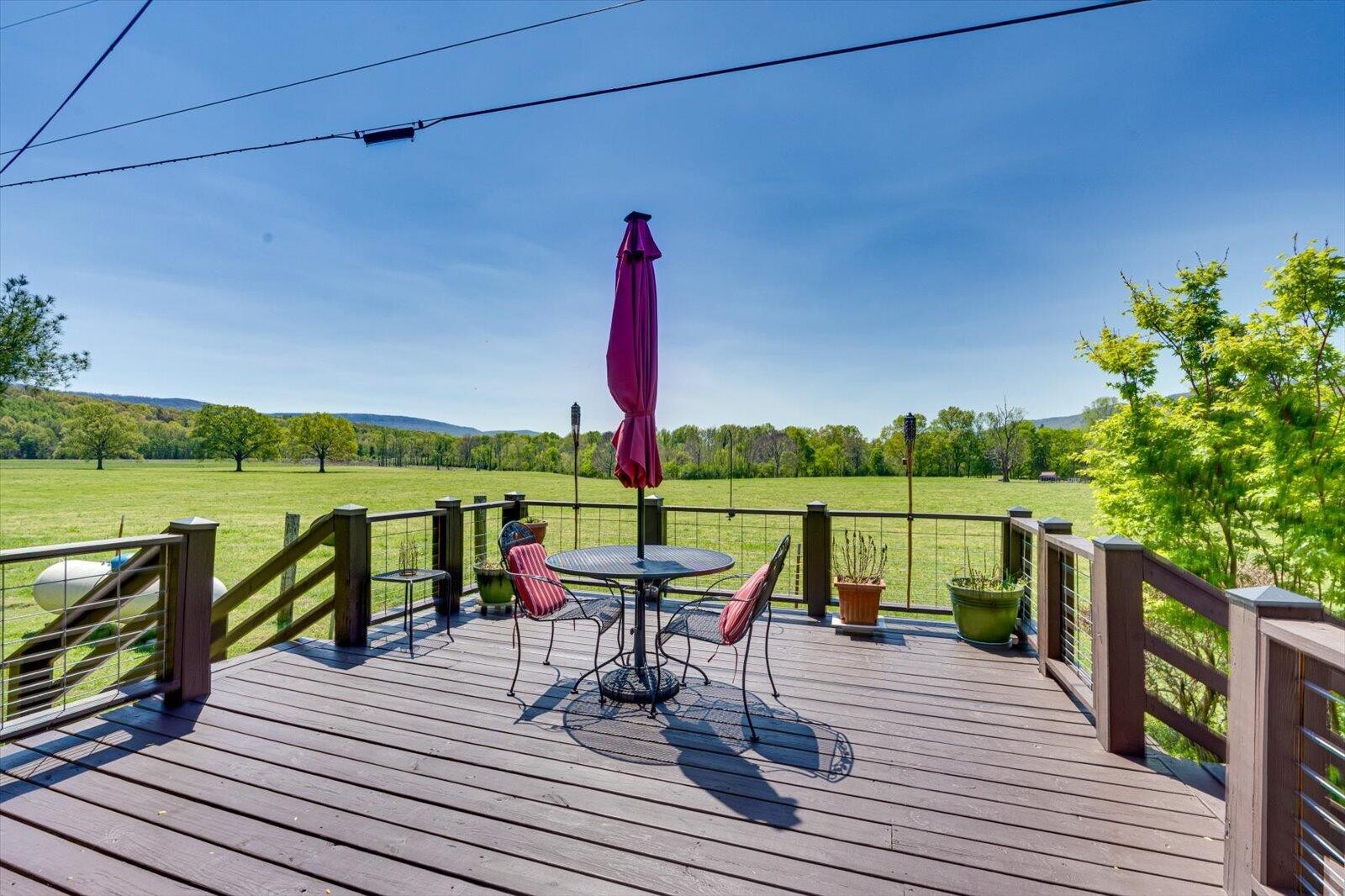487 Hackworth Road Whitwell, TN 37397 - Photo 30 of 48 a view of a deck with chair and table