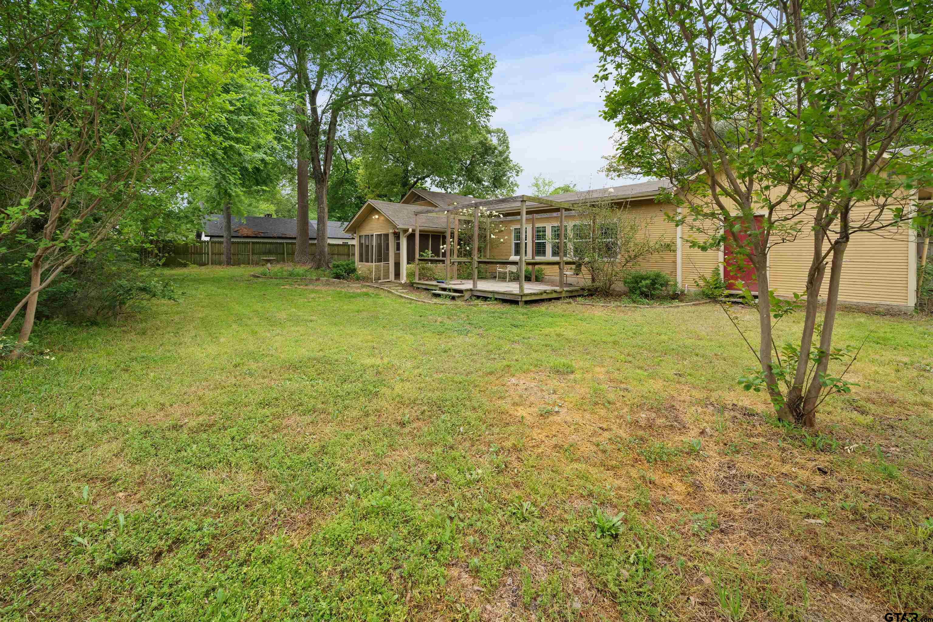 711 South Prairieville Street Athens, TX 75751 - Photo 25 of 27 front view of a house with a big yard