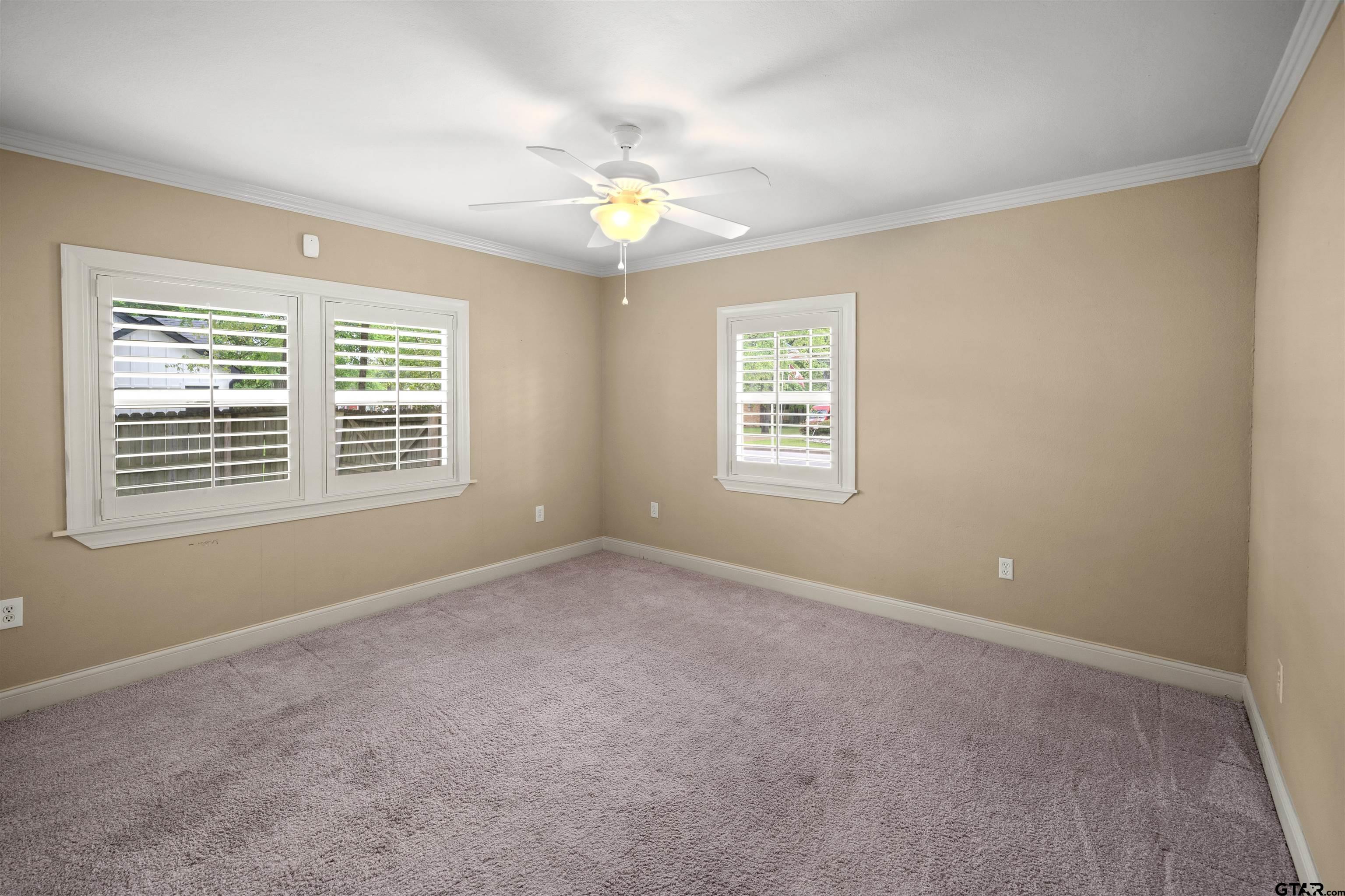 711 South Prairieville Street Athens, TX 75751 - Photo 10 of 27 a view of an empty room with a window