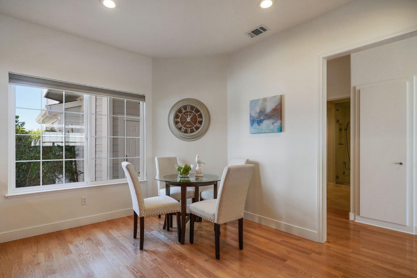 45 Outlook Circle Pacifica, CA 94044 - Photo 11 of 42 a view of a dining room with furniture window and wooden floor