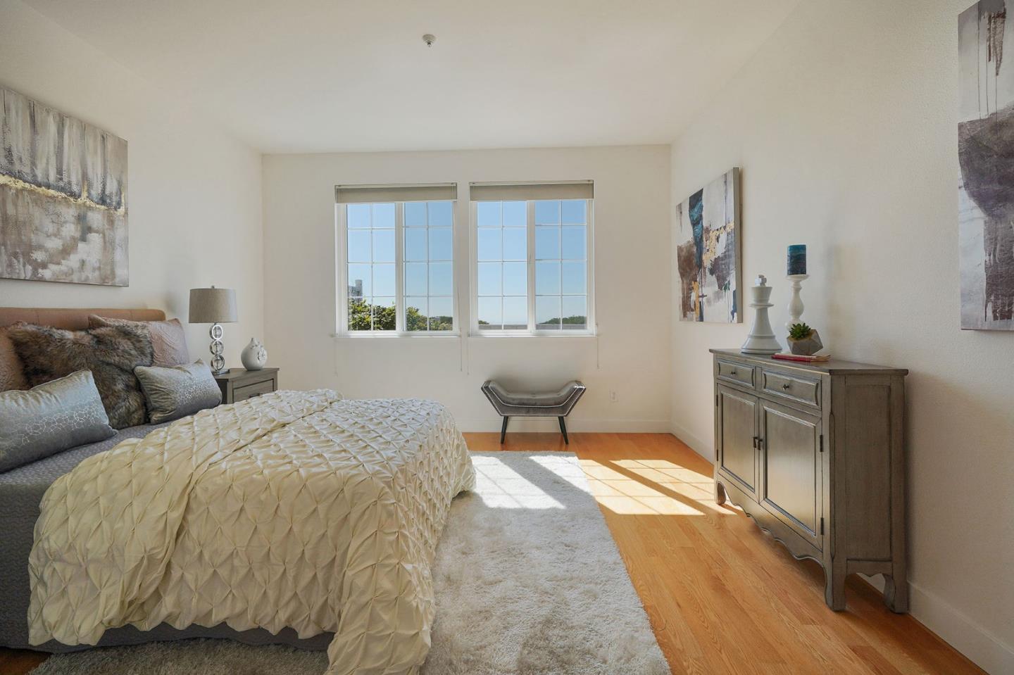 45 Outlook Circle Pacifica, CA 94044 - Photo 18 of 42 a bedroom with a bed and a couch