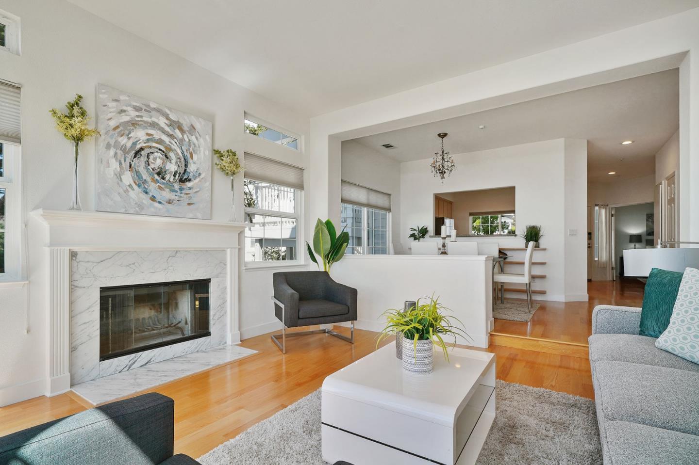 45 Outlook Circle Pacifica, CA 94044 - Photo 2 of 42 a living room with furniture and a fireplace