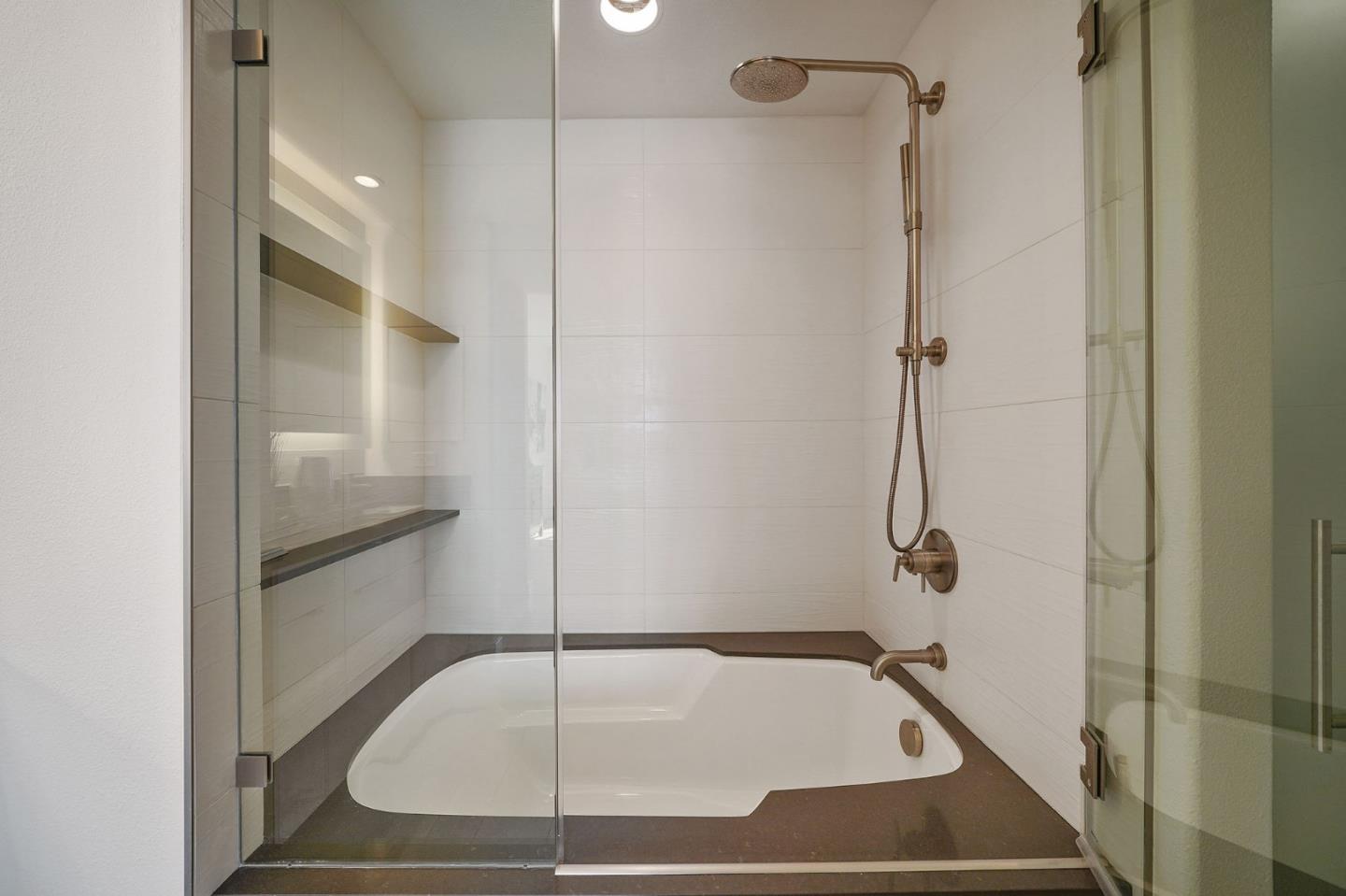 45 Outlook Circle Pacifica, CA 94044 - Photo 22 of 42 a bathroom with a glass shower door