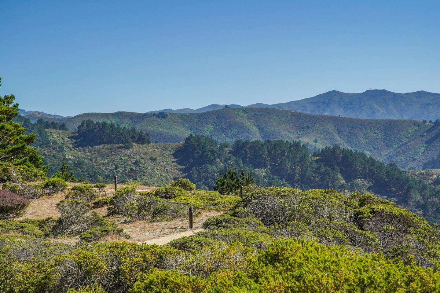 45 Outlook Circle Pacifica, CA 94044 - Photo 28 of 42 a view of a lake with mountains in the background