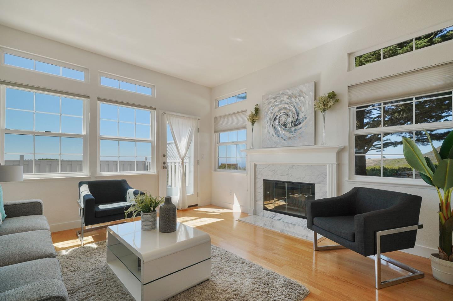 45 Outlook Circle Pacifica, CA 94044 - Photo 3 of 42 a living room with furniture and a fireplace