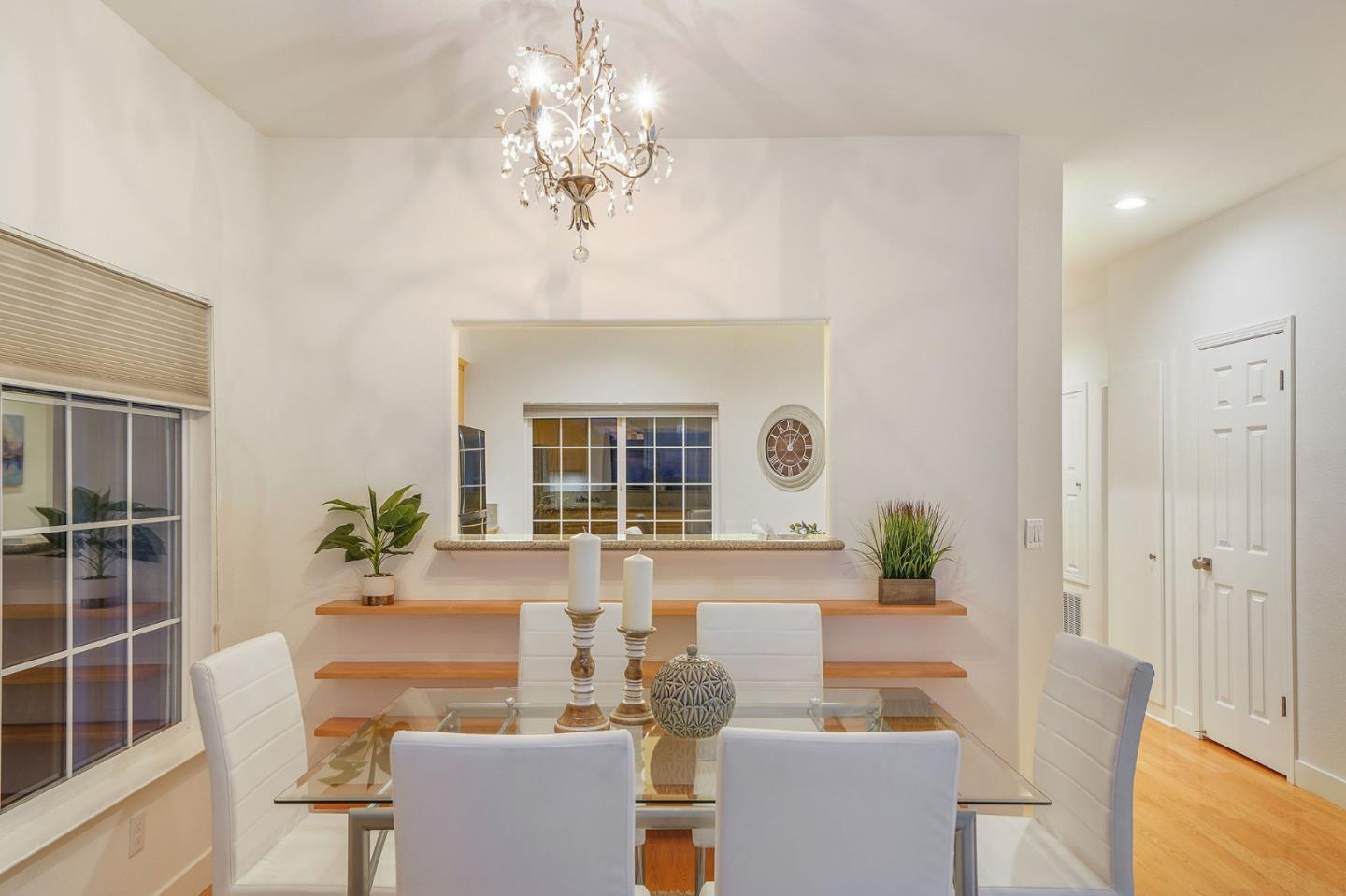45 Outlook Circle Pacifica, CA 94044 - Photo 33 of 42 a living room with furniture a chandelier and a window