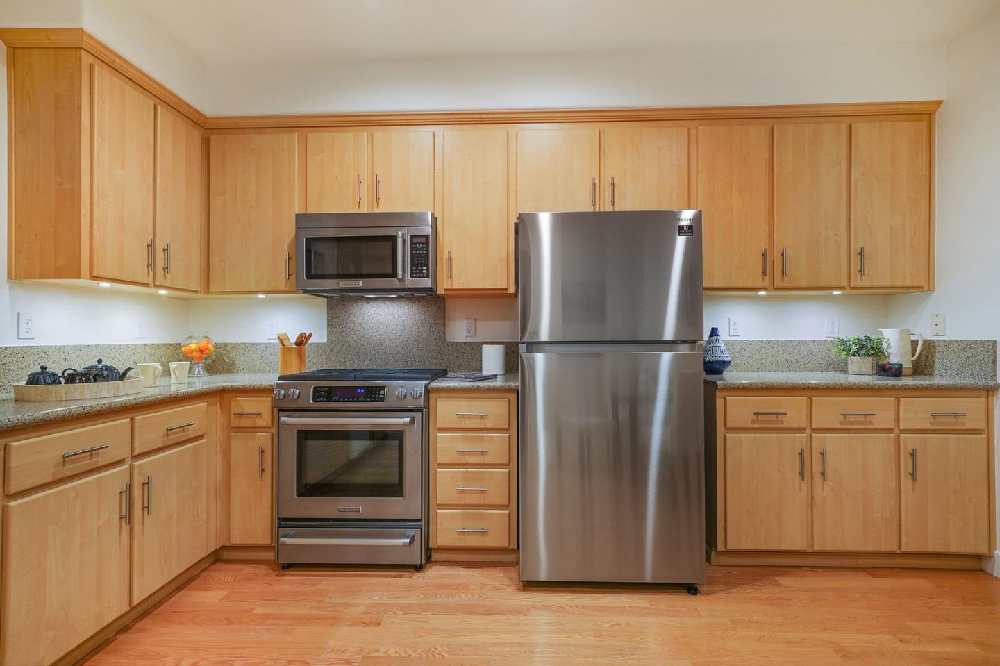 45 Outlook Circle Pacifica, CA 94044 - Photo 34 of 42 a kitchen with cabinets stainless steel appliances and a counter space