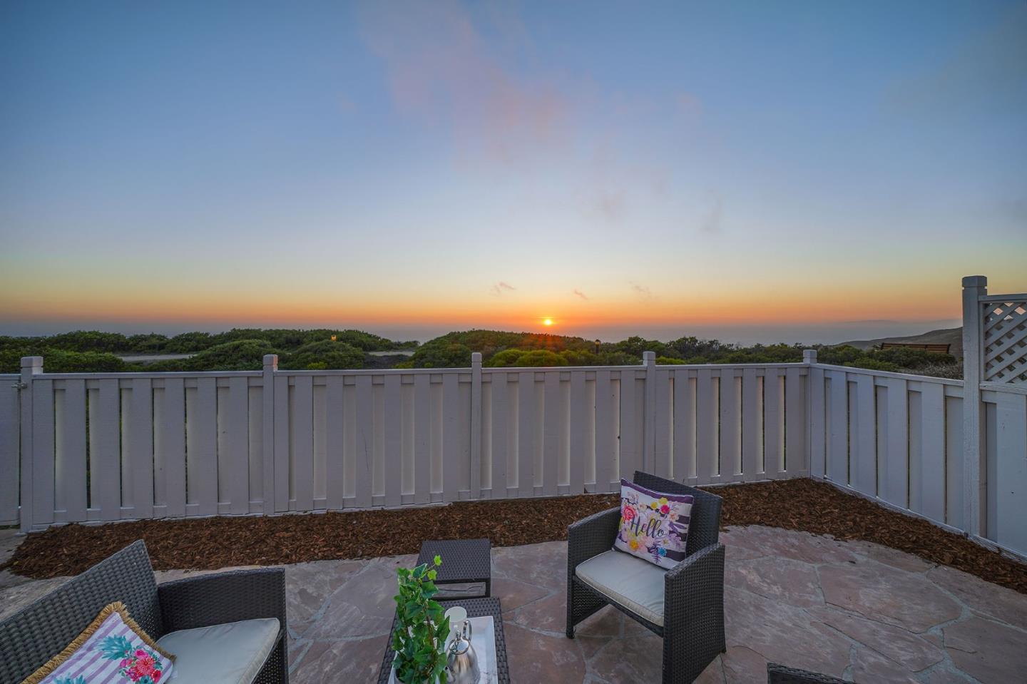 45 Outlook Circle Pacifica, CA 94044 - Photo 38 of 42 a backyard of a house with table and chairs