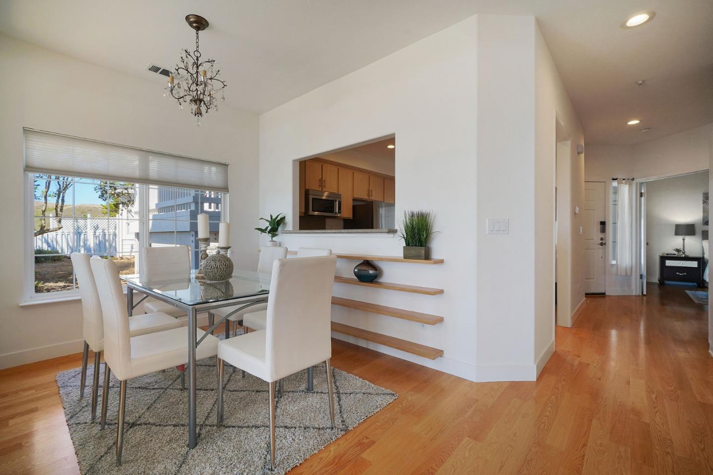 45 Outlook Circle Pacifica, CA 94044 - Photo 7 of 42 a view of a dining room with furniture window and wooden floor