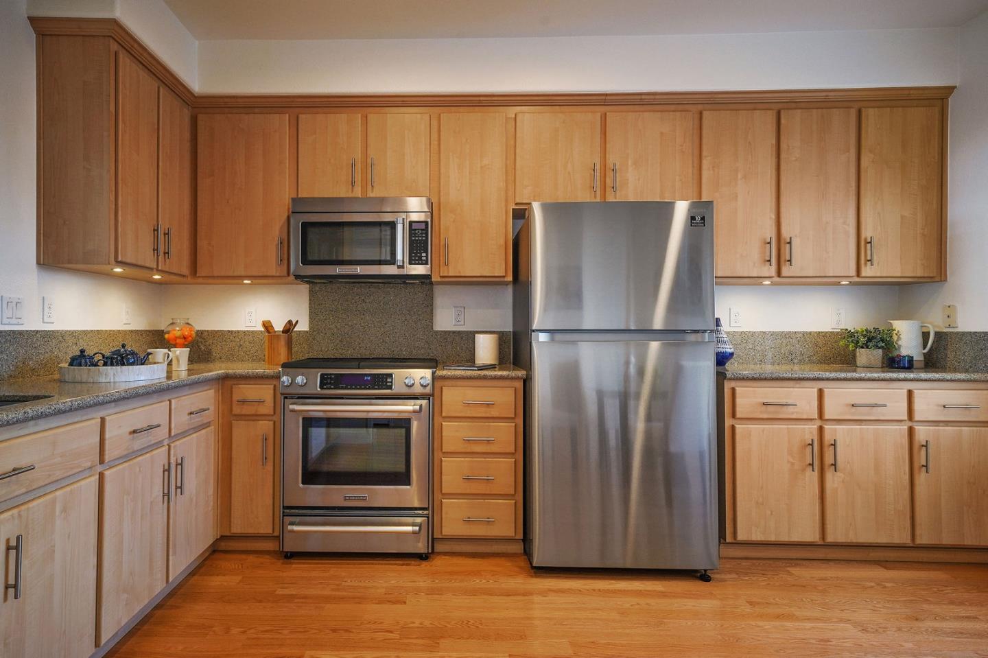 45 Outlook Circle Pacifica, CA 94044 - Photo 10 of 42 a kitchen with cabinets stainless steel appliances and a counter space