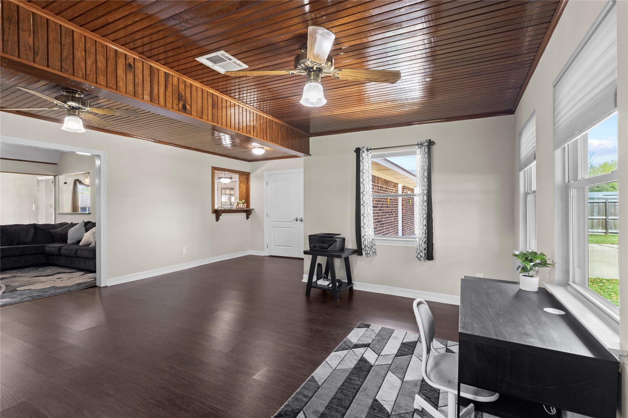 11546 Davidson Road Beaumont, TX 77705 - Photo 13 of 40 a workspace with furniture window and wooden floor