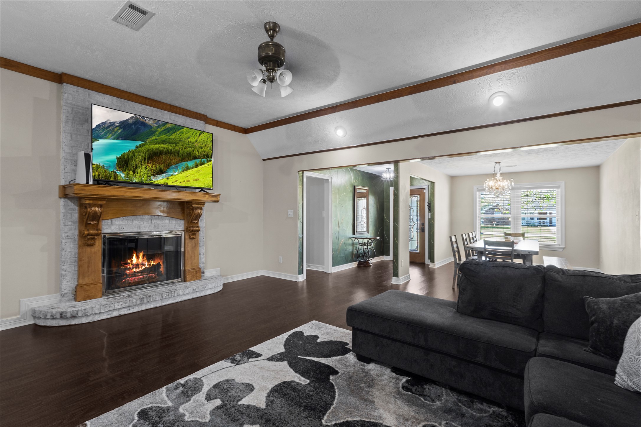 11546 Davidson Road Beaumont, TX 77705 - Photo 15 of 40 a living room with furniture and a fireplace
