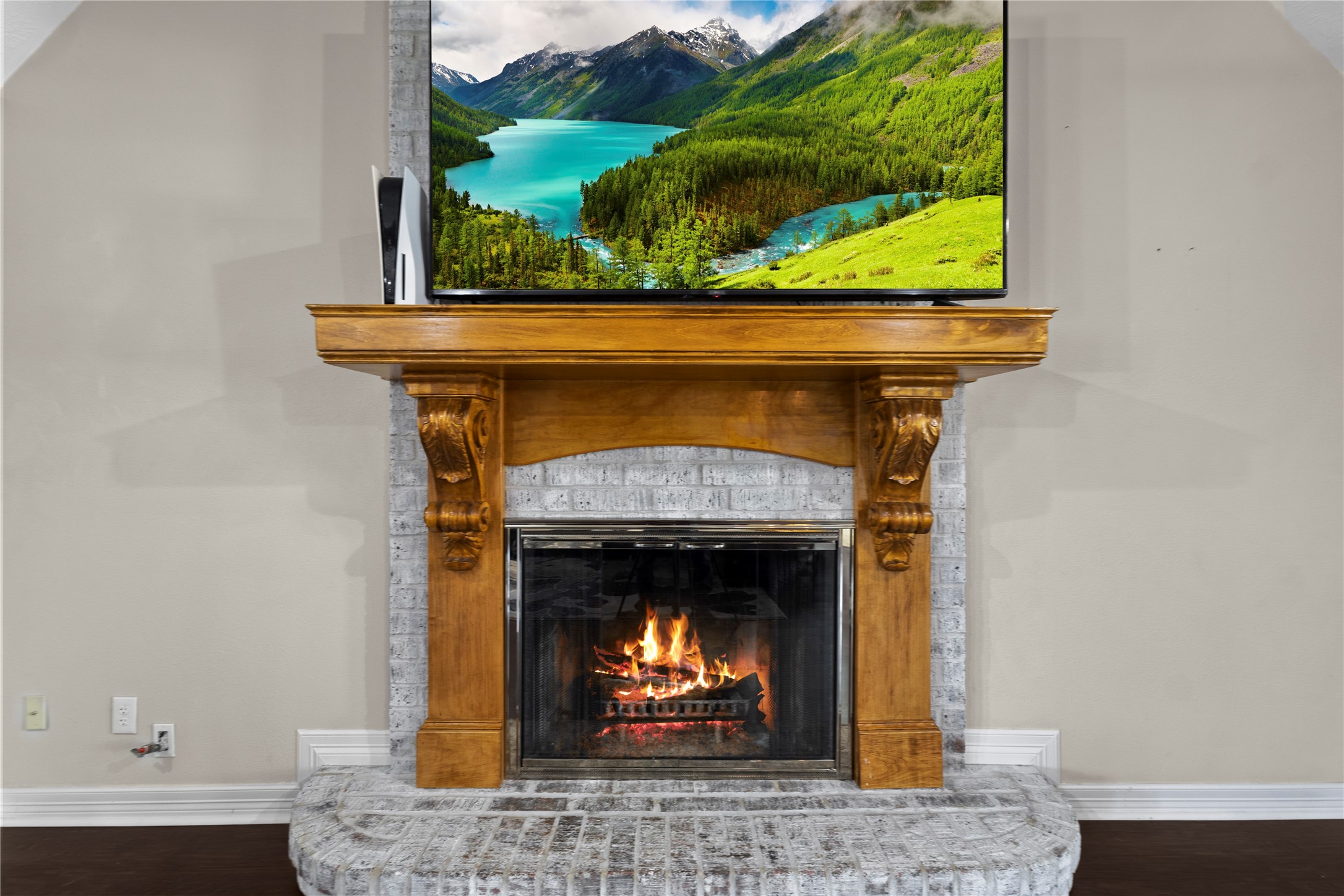 11546 Davidson Road Beaumont, TX 77705 - Photo 16 of 40 a fireplace with a clock on top of it