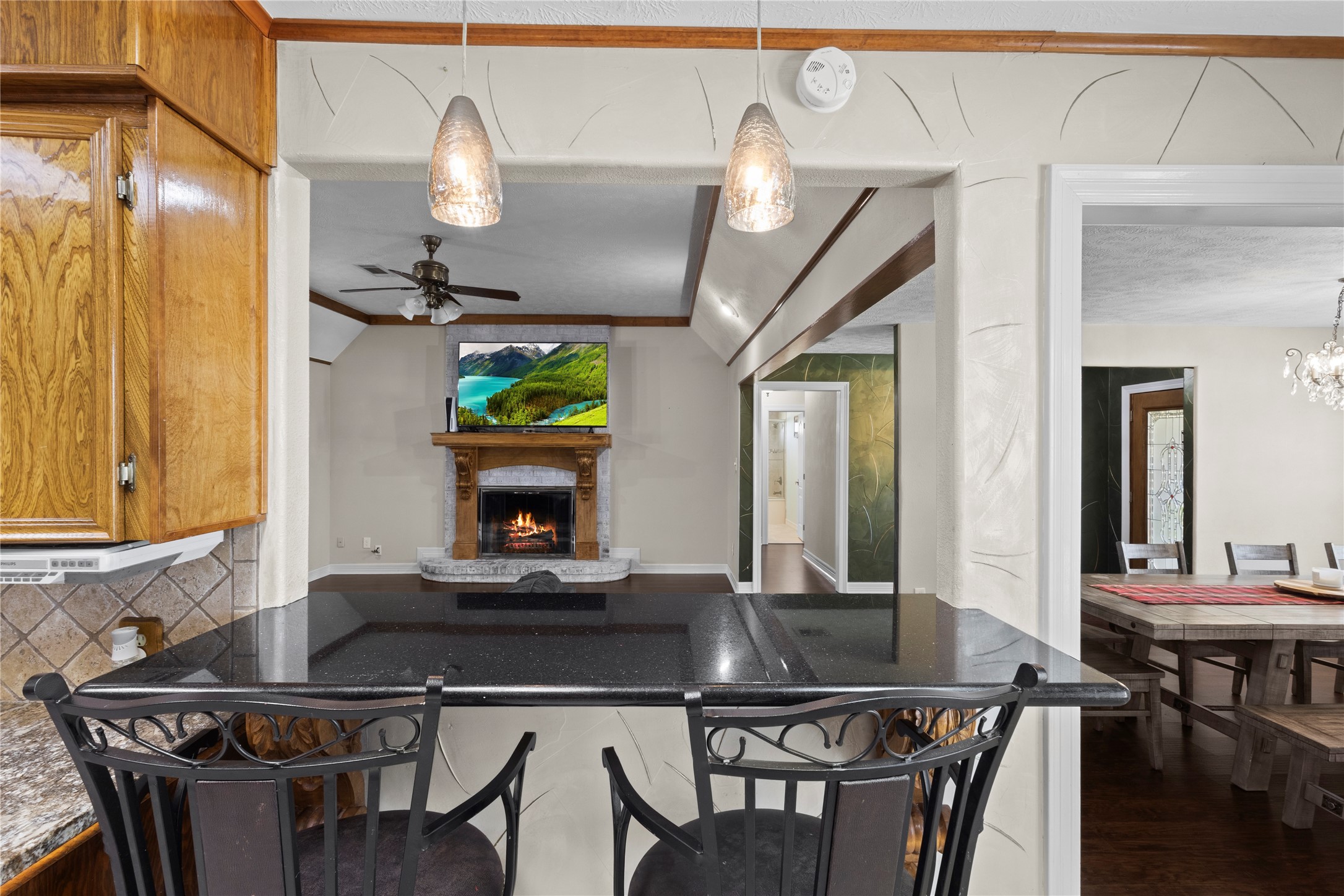 11546 Davidson Road Beaumont, TX 77705 - Photo 20 of 40 a view of a dining room with furniture and a chandelier
