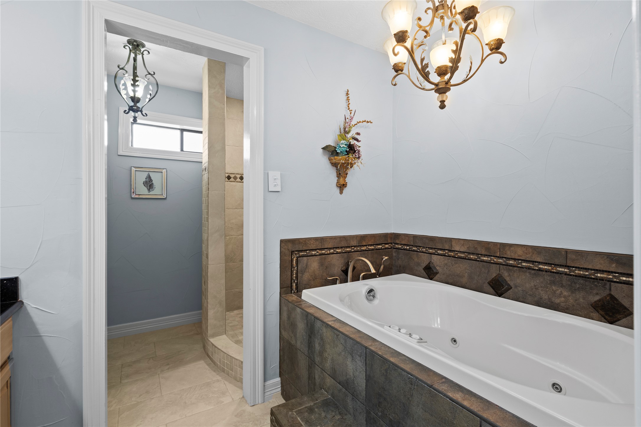 11546 Davidson Road Beaumont, TX 77705 - Photo 22 of 40 a view of a bathroom with a bathtub