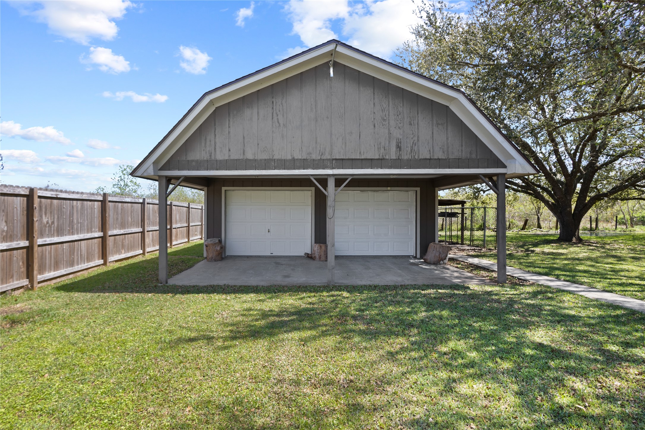 11546 Davidson Road Beaumont, TX 77705 - Photo 34 of 40 a front view of a house with a yard and garage