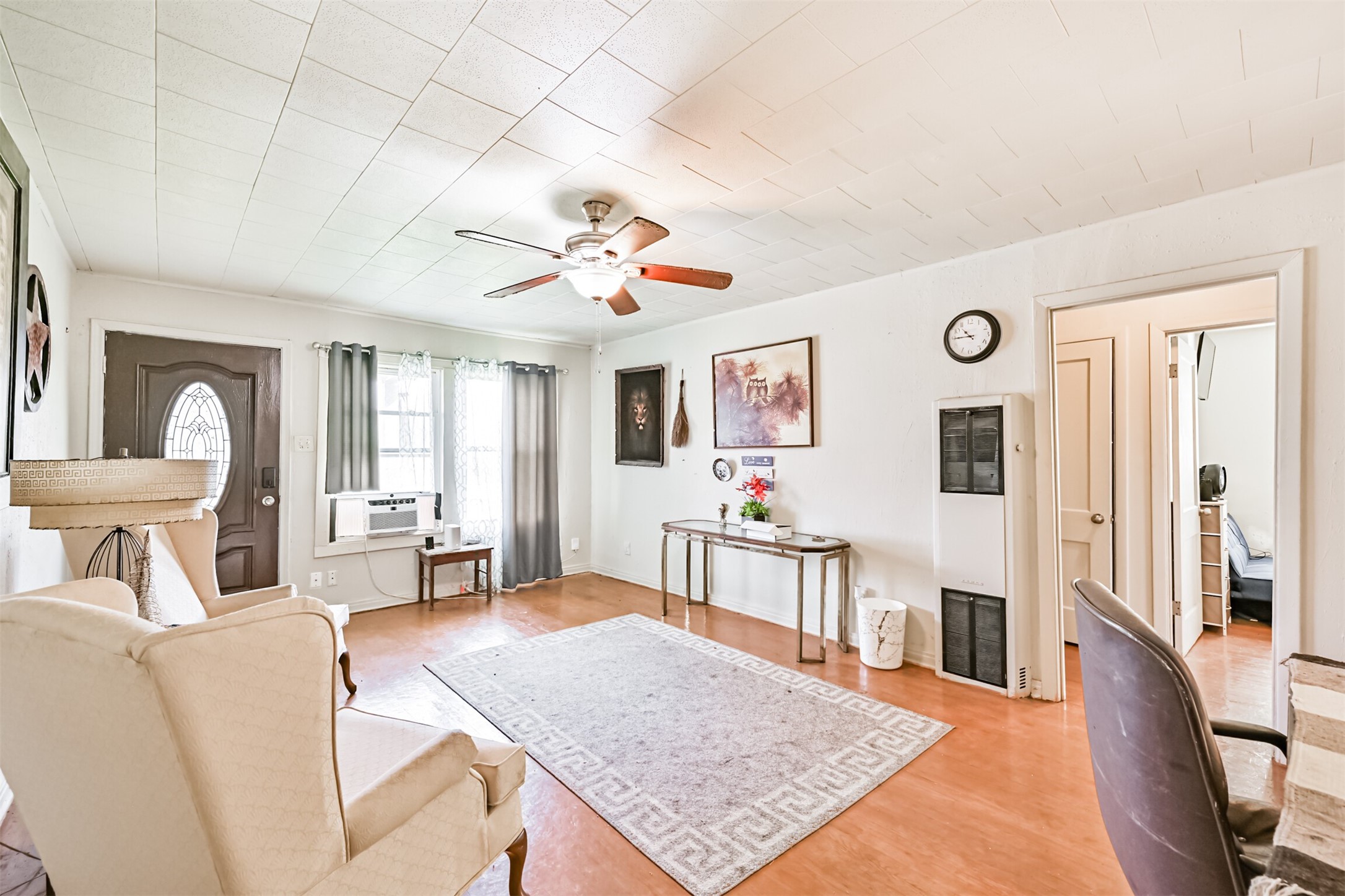 707 West 5th Street Freeport, TX 77541 - Photo 4 of 18 a living room with furniture and wooden floor